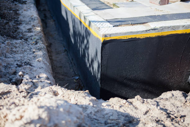 Professional Waterproofing technician working in Stow, OH